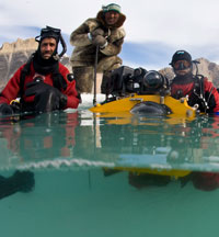 Filming To the Arctic: An Inuit guide flanked by cameramen Adam Ravetch, left, and Bob Cranston. Photo: Macgillivray Freeman Films
