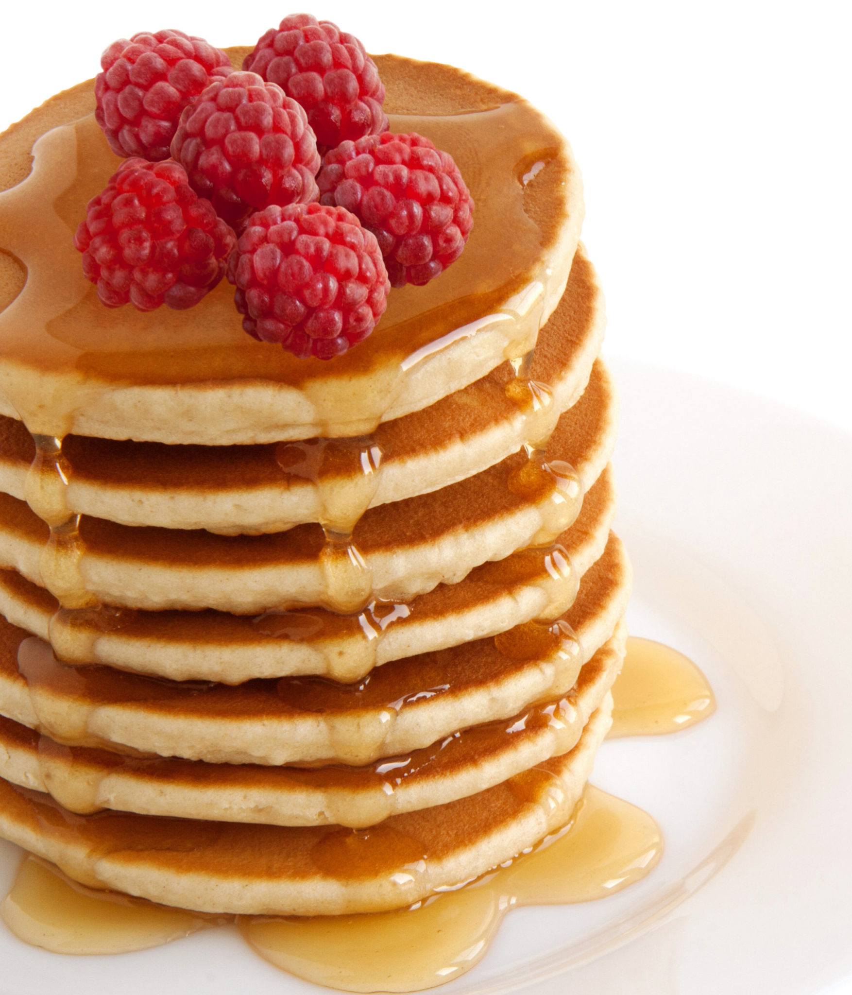 Pancakes Stack With Maple Syrup And Raspberries Isolated On A White Background. Family Breakfast. Brunch. Shrove Tuesday. Mardi Gras. Snacks. Sweets. Food.