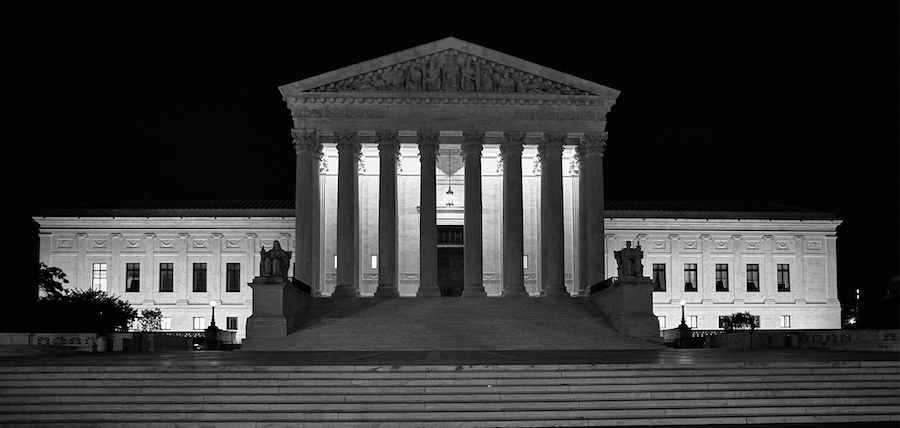 Supreme Court black & white photo at night courtesy Wikimedia